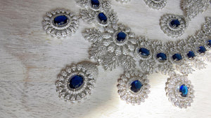 Rhodium Bridal Blue Sapphire Necklace Set with Earrings and Maang Tikka | CZ Indian Wedding Jewelry | Statement Necklace - Kajol