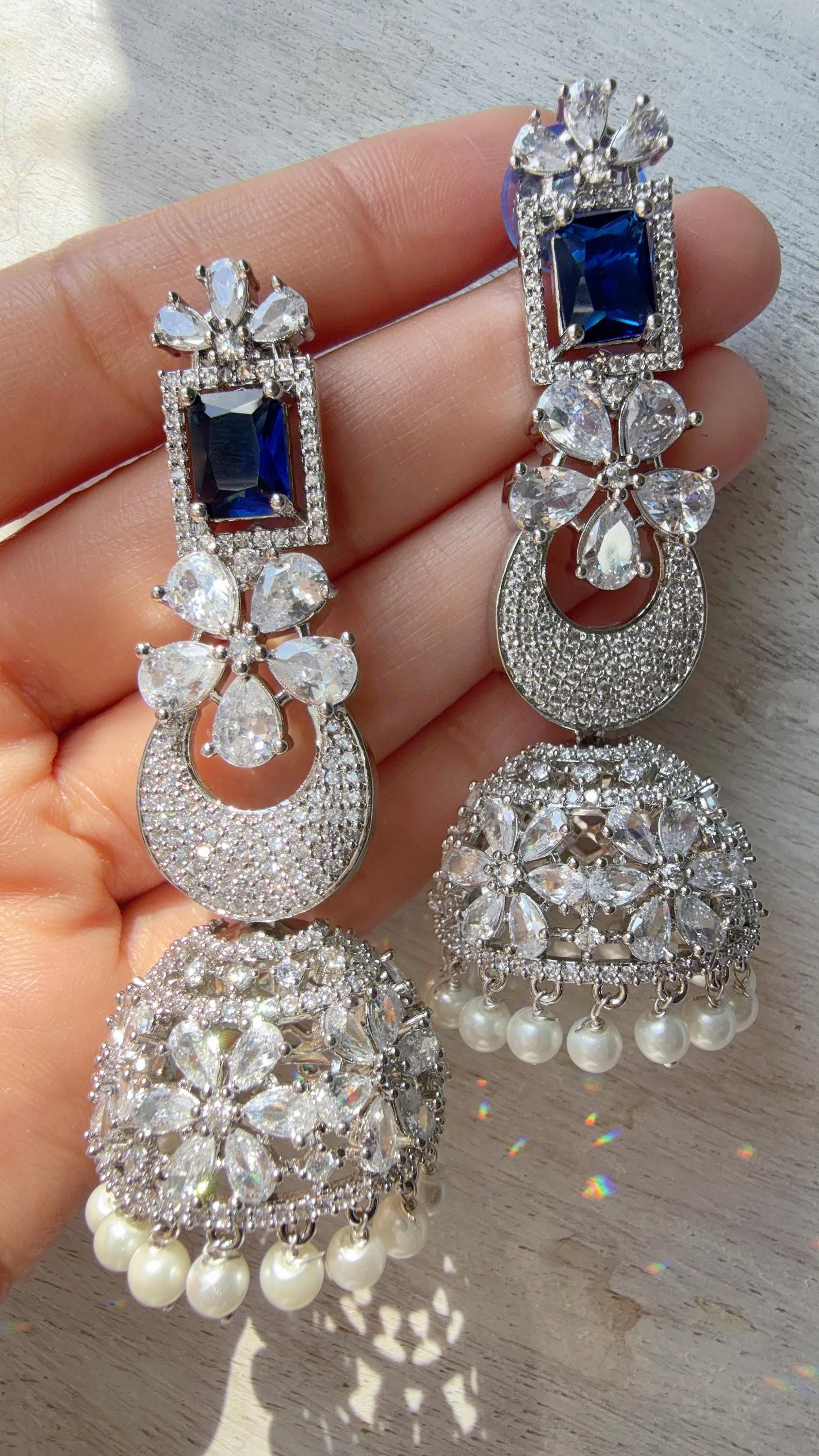 Anaya Rhodium Chaand diamond jhumka Earrings next to real/ Indian Jewelry Indian Earrings/American Diamond jhumka/CZ Earrings/